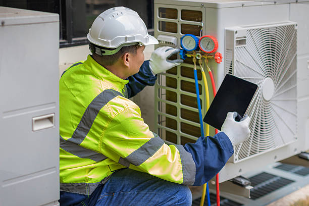 Professional Hvac technician working in Millfield, OH